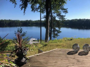 Modern stuga med strandtomt in Vittsjö